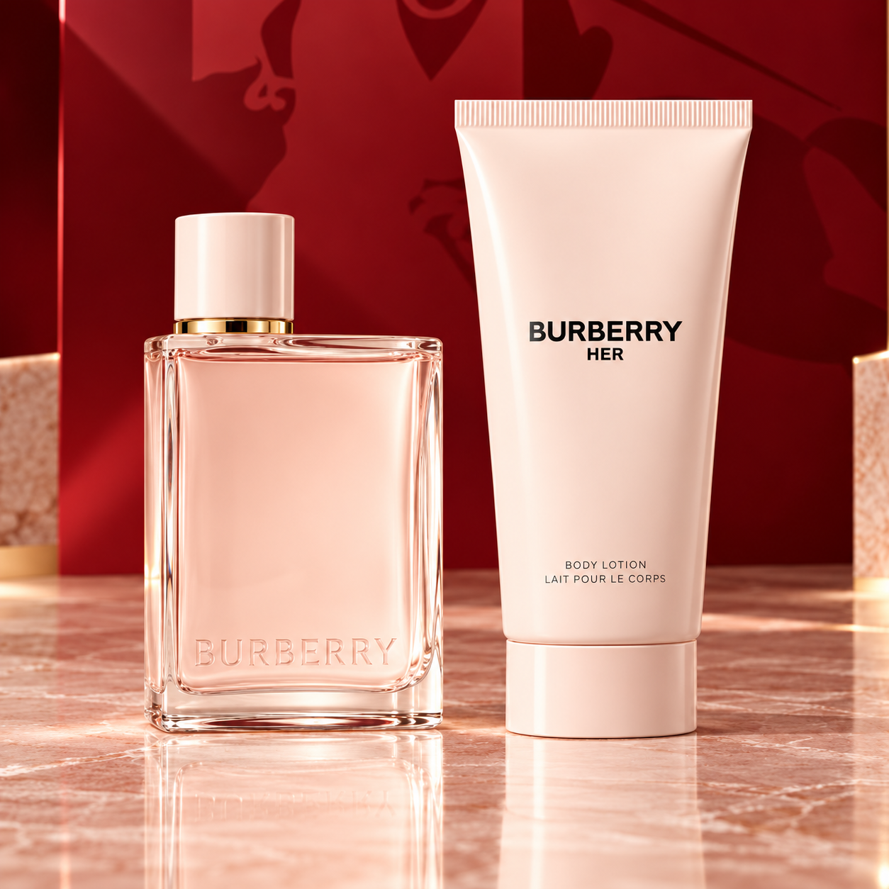 Burberry Her 50 ml Eau de Parfum bottle and 75 ml body lotion on a red studio background