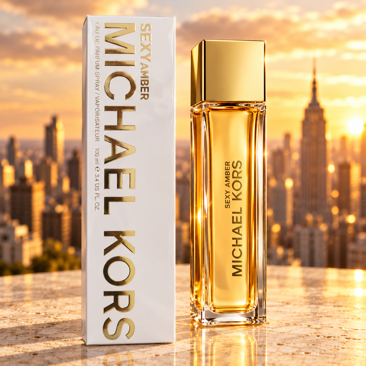Michael Kors Sexy Amber 100 ml perfume bottle beside its gold box on a warm city background.